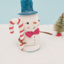 Load image into Gallery viewer, Closer view of spun cotton candy cane and snowman face. Pic 3 of 8.