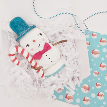 Load image into Gallery viewer, Spun cotton snowman laying in white gift box with white tissue shredding. Pic 4 of 8.