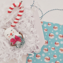 Cargar imagen en el visor de la galería, spun cotton snowman and spun cotton candy cane laying in white gift box with white tissue shredding. Pic 6 of 7.