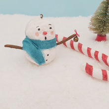 Cargar imagen en el visor de la galería, Spun cotton snowman holding jingle bell, sitting next to spun cotton candy ornament. Pic 1 of 6.