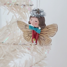 Load image into Gallery viewer, Side view of spun cotton Christmas butterfly angel ornament, dangling on tree. Pic 2 of 6