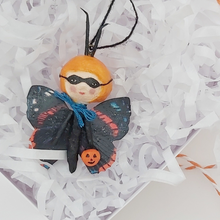 Load image into Gallery viewer, Spun cotton Halloween butterfly ornament in gift box surrounded by white tissue shredding. Pic 3 of 5.