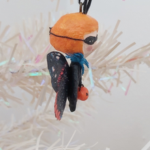 Load image into Gallery viewer, Another side view of spun cotton Halloween butterfly ornament. Pic 5 of 5.