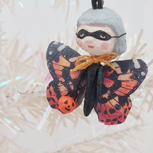 Load image into Gallery viewer, A close up of spun cotton butterfly's wings in colours of orange, black and red. Pic 3 of 6.