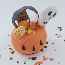 Load image into Gallery viewer, Close up of spun cotton candy in spun cotton pumpkin bucket. Pic 3 of 5.
