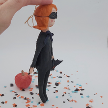 Load image into Gallery viewer, Side view of spun cotton bat girl, standing on Halloween confetti. Pic 7 of 9.