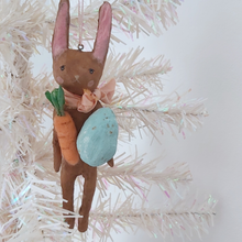 Cargar imagen en el visor de la galería, Spun cotton chocolate brown Easter bunny ornament hanging on white tree. Pic 1 of 8.