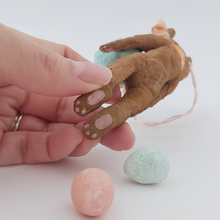 Cargar imagen en el visor de la galería, Close up of spun cotton Easter bunny's paws. Pic 6 of 8.