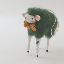 Load image into Gallery viewer, Close up of spun cotton dark green sheep's face, mustard yellow bow tie and shamrock on leg. Pic 5 of 5.