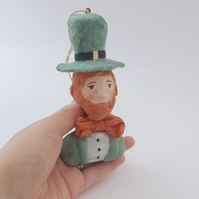 Load image into Gallery viewer, Spun cotton leprechaun ornament, held in hand. for size comparison. Pic 2 of 7.