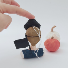 Load image into Gallery viewer, Back view of spun cotton pirate boy ornament. Pic 7 of 7.