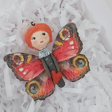 Load image into Gallery viewer, Spun cotton Valentine's Day butterfly girl, laying in white gift box with white tissue shreds. Pic 3 of 4.