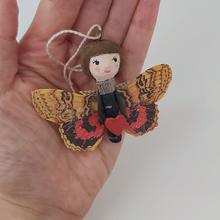 Load image into Gallery viewer, Spun cotton Valentine's Day butterfly girl, held in hand for size comparison. Pic 2 of 4.