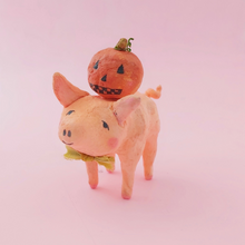 Load image into Gallery viewer, Spun cotton pig wearing mustard yellow bow tie, with jack o lantern on his back.