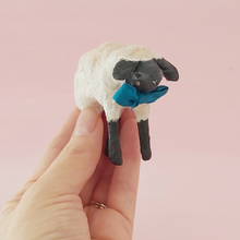 Load image into Gallery viewer, Vintage style miniature spun cotton sheep held in hand against a pink background. Pic 2 of 8.