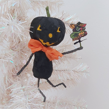 Load image into Gallery viewer, Vintage style spun cotton black jack-o'-lantern man hanging on white tree on white background. Pic 1 of 8.