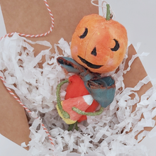 Load image into Gallery viewer, Vintage style spun cotton jack-o'-lantern sitting in white gift box surrounded by white tissue shredding, on a white background. Pic 4 of 8.