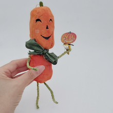 Cargar imagen en el visor de la galería, Vintage style spun cotton jack-o'-lantern man held in hand on white background. Pic 2 of 8.
