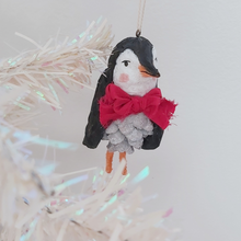 Load image into Gallery viewer, Vintage style spun cotton pine cone penguin ornament hanging on white Christmas tree. Pic 3 of 10. 
