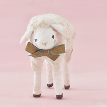 Load image into Gallery viewer, A close-up view of spun cotton sheep's face and bow, against a pink background. Pic 3 of 8.