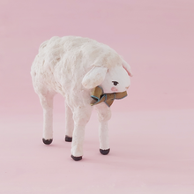 Load image into Gallery viewer, Another side front view of spun cotton sheep against a pink background. Pic 6 of 8.