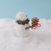 Load image into Gallery viewer, Another side view of vintage style spun cotton snowman holding vintage gold pine cone. Pic 7 of 11.