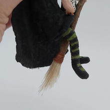 Load image into Gallery viewer, Broom close-up on spun cotton witch ornament. Pic 6 of 10.