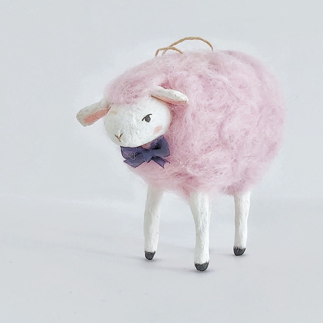A cotton candy pink needle felted sheep ornament, standing against a white background. Pic 1 of 8. 