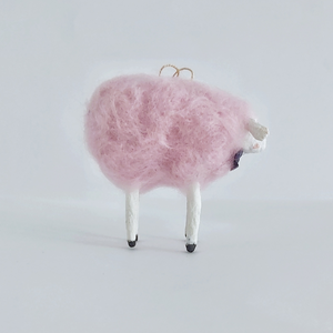 A side view of a needle felted cotton candy pink sheep ornament. Pic 5 of 8. 