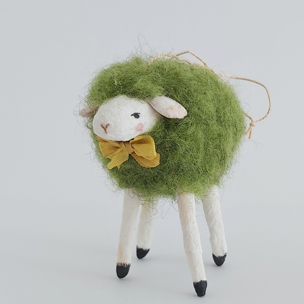 A vintage style needle felted green sheep ornament against a white background. Pic 1 of 7.