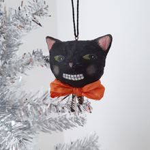 Load image into Gallery viewer, A vintage style, spun cotton black cat ornament hanging from a silver tree against a white background. Pic 1 of 6. 
