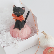 Load image into Gallery viewer, A vintage style spun cotton black cat in a pink pumpkin, sitting in a white gift box on white tissue shredding. Spun cotton white and orange pumpkins sit in front of the box. Pic 5 of 7. 

