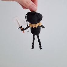 Load image into Gallery viewer, The back view of a vintage style, spun cotton black pumpkin man ornament. Pic 6 of 7. 
