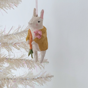 A vintage style, spun cotton bunny ornament hanging on a white tree. Pic 3 of 12. 