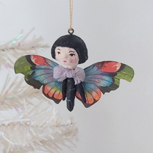 Load image into Gallery viewer, A vintage style spun cotton butterfly girl ornament hanging on a white tree. Pic 2 of 7. 
