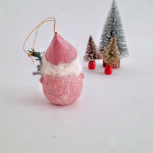Load image into Gallery viewer, The back view of pink gnome ornament with a white beard on a white background.
