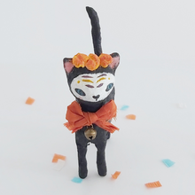 Load image into Gallery viewer, A close, front view of the spun cotton Day of the Dead black cat. Pic 2 of 9. 
