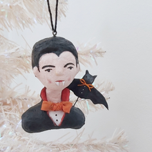 Load image into Gallery viewer, Vintage style spun cotton dracula ornament hanging from a tree. Pic 3 of 8. 
