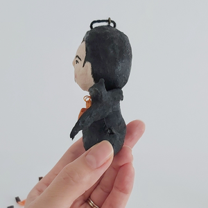 Another opposite side view of a vintage style spun cotton dracula ornament. Pic 8 of 8. 