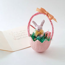 Load image into Gallery viewer, A decorative Easter egg with a small  spun cotton bunny, eggs, and chocolate boxed bunny inside, on a white background
