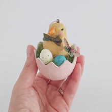 Load image into Gallery viewer, A vintage style spun cotton Easter chick egg ornament being held in a hand against a white background. Pic 4 of 7. 
