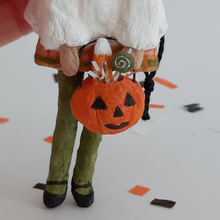 Load image into Gallery viewer, A close-up of a spun cotton jack-o-lantern bucket. Pic 4 of 8. 
