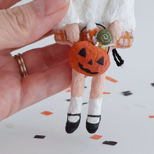 Load image into Gallery viewer, A close-up of a vintage style, spun cotton jack-o-lantern bucket against a white background. Pic 4 of 8. 
