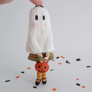 A vintage style, spun cotton ghost girl standing on Halloween confetti against a white background. Pic 1 of 7