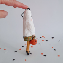 Cargar imagen en el visor de la galería, An opposite side view of a vintage style, spun cotton ghost girl ornament on Halloween confetti against a white background. Pic 7 of 7. 
