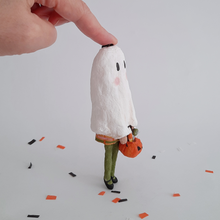 Cargar imagen en el visor de la galería, A side view of a vintage style, spun cotton ghost girl ornament on Halloween confetti against a white background. Pic 6 of 8. 
