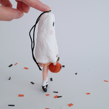 Load image into Gallery viewer, Another side view of a vintage style, spun cotton ghost girl ornament on Halloween confetti against a white background. Pic 8 of 8. 
