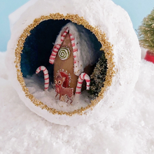 Load image into Gallery viewer, Another close-up of a vintage style spun cotton gingerbread house diorama ornament sitting on fake snow. Pic 4 of 6. 
