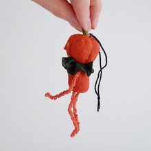 Load image into Gallery viewer, A side view of a vintage style, spun cotton pumpkin man ornament against a white background. Pic 5 of 8. 
