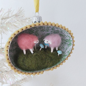 A vintage style spun cotton sheep diorama ornament hanging from a white tree. Pic 2 of 6. 